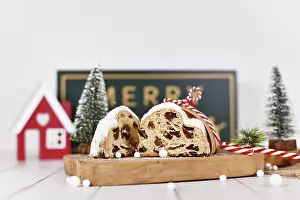 Christmas Fruit Bread Drucke: Cut open German Stollen cake, a fruit bread with nuts