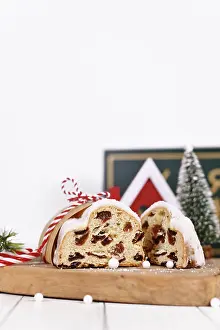 Christmas Sweets Drucke: Cut open German Stollen cake, a fruit bread with nuts