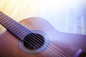 Musician Studio Shot Drucke: Cutout of a classical guitar corpus and strings