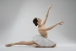 Female Dancer Drucke: A dancer gracefully executes a pose