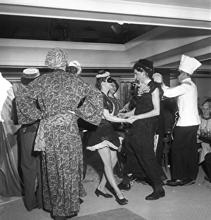 Dancing in the 1950s. Dance at a masquerade