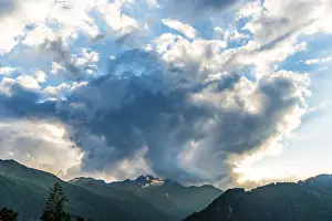 Tyrol Austria Landscape Drucke: Dark clouds over Alpine panorama