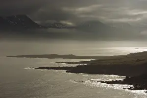 Coastal Area Nature Photos Drucke: Dark clouds over the mountains