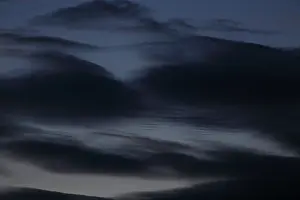 Overcast Sky In Europe Drucke: Dark clouds sweep across the sky at dusk