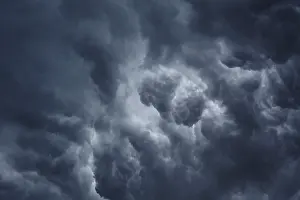 Stormy Atmosphere Drucke: Dark cloudy sky with storm clouds