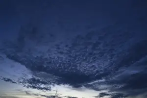 Deserted Evening Landscapes Drucke: Dark fleecy clouds, cirrocumulus, evening sky