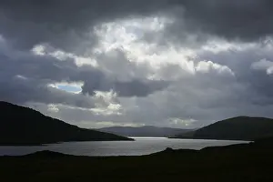 Sutherland County Landscapes Drucke: Dark lake under dramatically cloudy sky