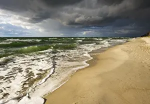 Northern Germany Nature Photography Drucke: Dark rain clouds over Weststrand Beach