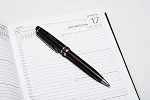 Time Management Tools Drucke: Day planner with a pen