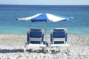 Relaxation At The Beach Drucke: Deck chairs at the beach of Albir