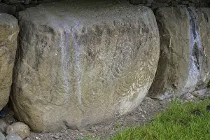 UNESCO World Heritage Site Ireland Drucke: Decorated wall stone at the Knowth megalithic complex