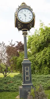 Deserted City Square Europe Drucke: DEcorative clock on Unirii square