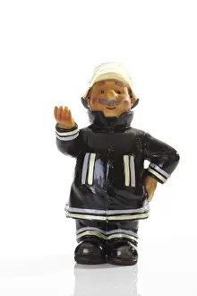 Exposed Studio Photography Drucke: Decorative fireman figure