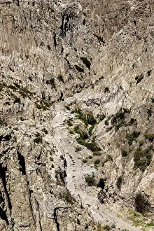 Valle De La Luna Moon Valley Drucke: Deep rocky gorge with sparse vegetation