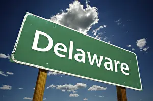 Symbolic American Picture Drucke: Delaware road sign with dramatic clouds and sky