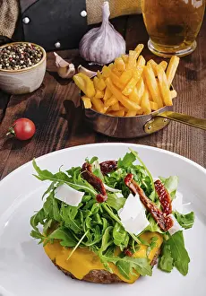 Arugula Salad Drucke: Delectable cheeseburger topped with arugula