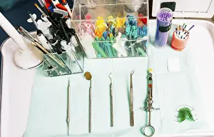 Healthcare Professional Tools Drucke: Dentist tools on the table. Top view of stomatologist tools on table