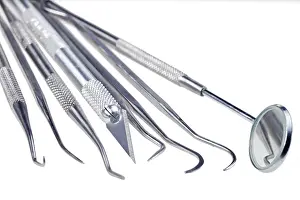 Healthcare Profession Drucke: Dentists tools isolated on a white background