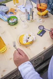 Tropical Fruit Desserts Drucke: Dessert with pineapple and cream on a table with drinks