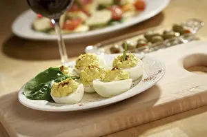 Food Photography Starter Drucke: Deviled eggs and appetizers on a decorative white plate