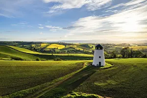 British Agricultural Landscape Drucke: Devon Windmill from a drone, Fields and Farms