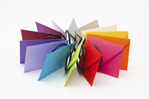 Colorful Stationery Drucke: Different colored envelopes on the white table