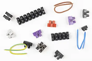 Studio Shot Background Drucke: Different colored terminals and cables on white background