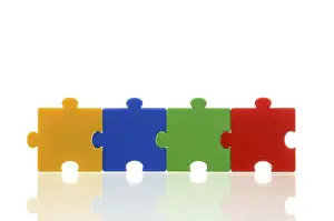 Jigsaw Puzzle Pieces Drucke: Four different coloured puzzle pieces