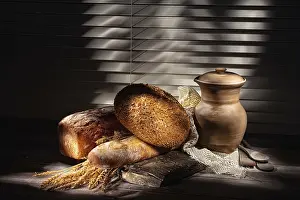 White Bread Nutrition Facts Drucke: Different kinds of bread and ceramic vase on a studio background