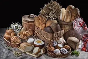 Bread Studio Photography Drucke: Different kinds of bread, milk and egg on a canvas studio background