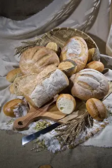 Wholemeal Bread Arrangement Drucke: Different kinds of bread and pastry on a canvas studio background
