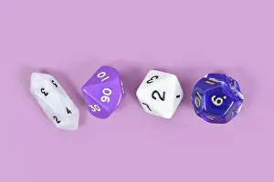 Roleplaying RPG Dice Drucke: Different roleplaying RPG dice on violet background