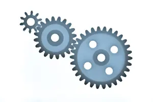 Studio Shot Of Gears Drucke: Three different sized plastic gear wheels