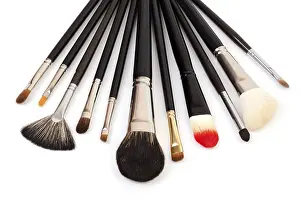 Beauty Accessories Drucke: Different types of makeup brushes on white background