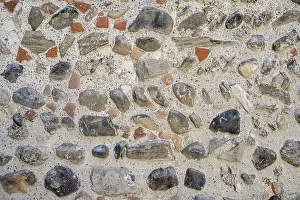 Stone Wall Background Drucke: Different types of stone processed into a wall Format-filling