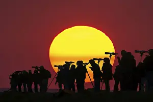 Europe Evening Atmosphere Drucke: Digital composing, people with telescopes in front of setting sun