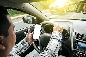 Distracted Driving Drucke: Distracted driver using the cell phone while driving