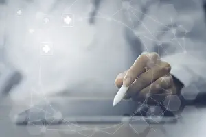 Digital Healthcare System Drucke: Doctor using digital tablet virtual screen