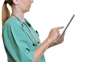 Medical Diagnosis Technology Drucke: Doctor using a tablet computer, cut out