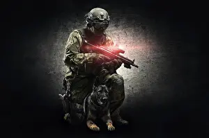 German Shepherd Breed Drucke: Dog handler posing in the studio with a trained shepherd