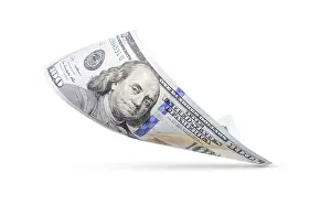 US Dollar Note Drucke: One hundred dollar bill floating down to surface with drop shadow isolated on a white background