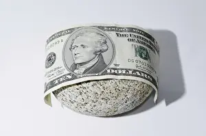 US Dollar Note Drucke: The Bill of Ten Dollar Lying on a Stone with White Background