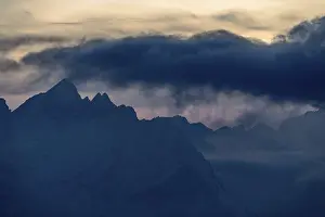 Backlit Mountain Photography Drucke: Dolomites mountain top with dramatic sky