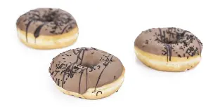 White Background Desserts Drucke: Donuts isolated on white background (selective focus)