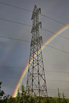 Electric Power Wire Overhead Line Drucke: Double rainbow behind a high-voltage pylon