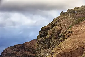 Lanzarote Cliffs Drucke: Dramatic cliffs above the sea under a cloudy sky