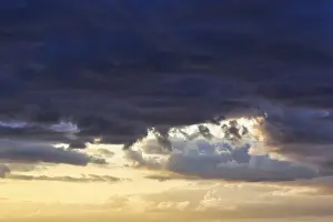 Scandinavian Evening Mood Drucke: Dramatic cloud sky at sunset, blue and yellow