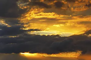 Sunset In Northern Germany Drucke: Dramatic cloud sky at sunset, Schleswig-Holstein