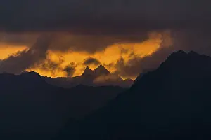 Sunrise In Austria Drucke: Dramatic clouds above Lechtal mountains