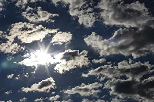 Upper Austria Sky Drucke: Dramatic cloudy sky with sunbeams